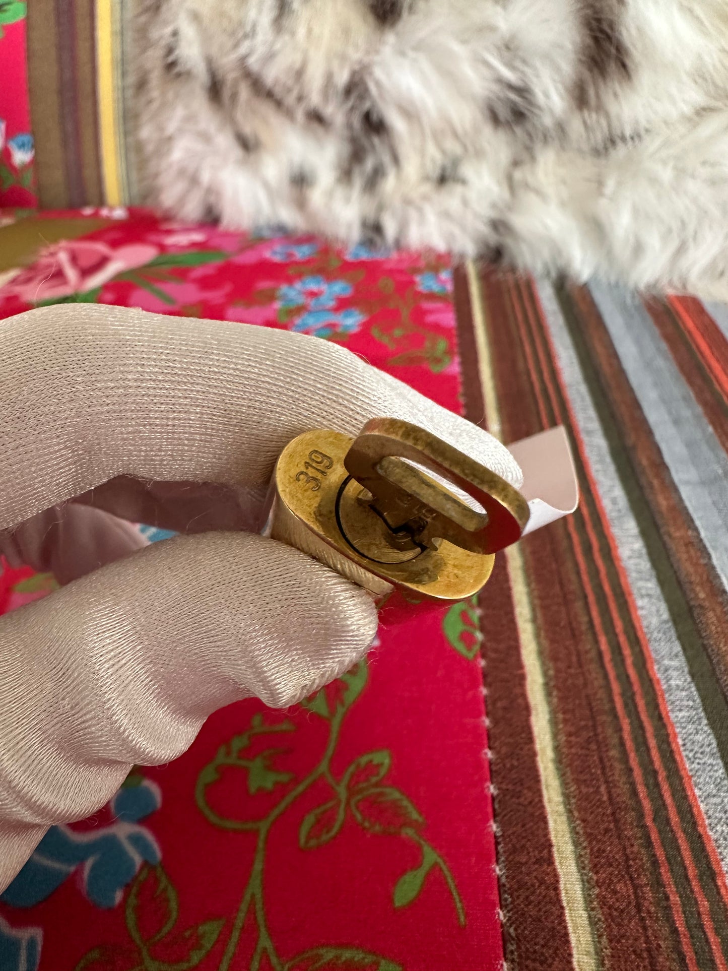 Louis Vuitton - Cadenas doré avec sa clé
